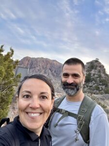 Kathy and John at the Trailhead for the South Rim Trail, smiling. 