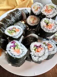 veggies rolled in rice and nori as sushi