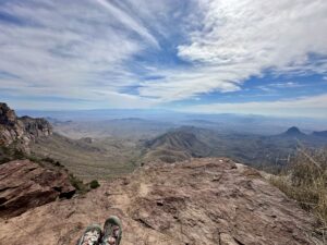 Overlook at the South Rim of Big Bend Looking over Mexico, wide angle shot with Kathy's feet at the bottom of the image